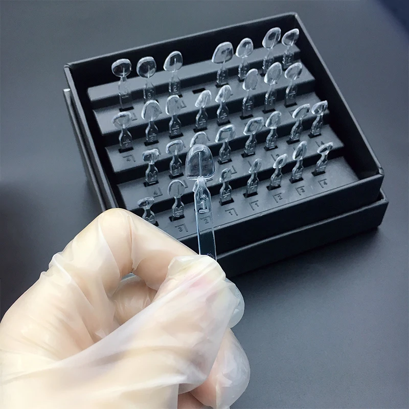 歯科用ベニア型オートクレーブ複合樹脂型光硬化高速クイック前歯 - Teeth Whitening Moulds のレビューと価格